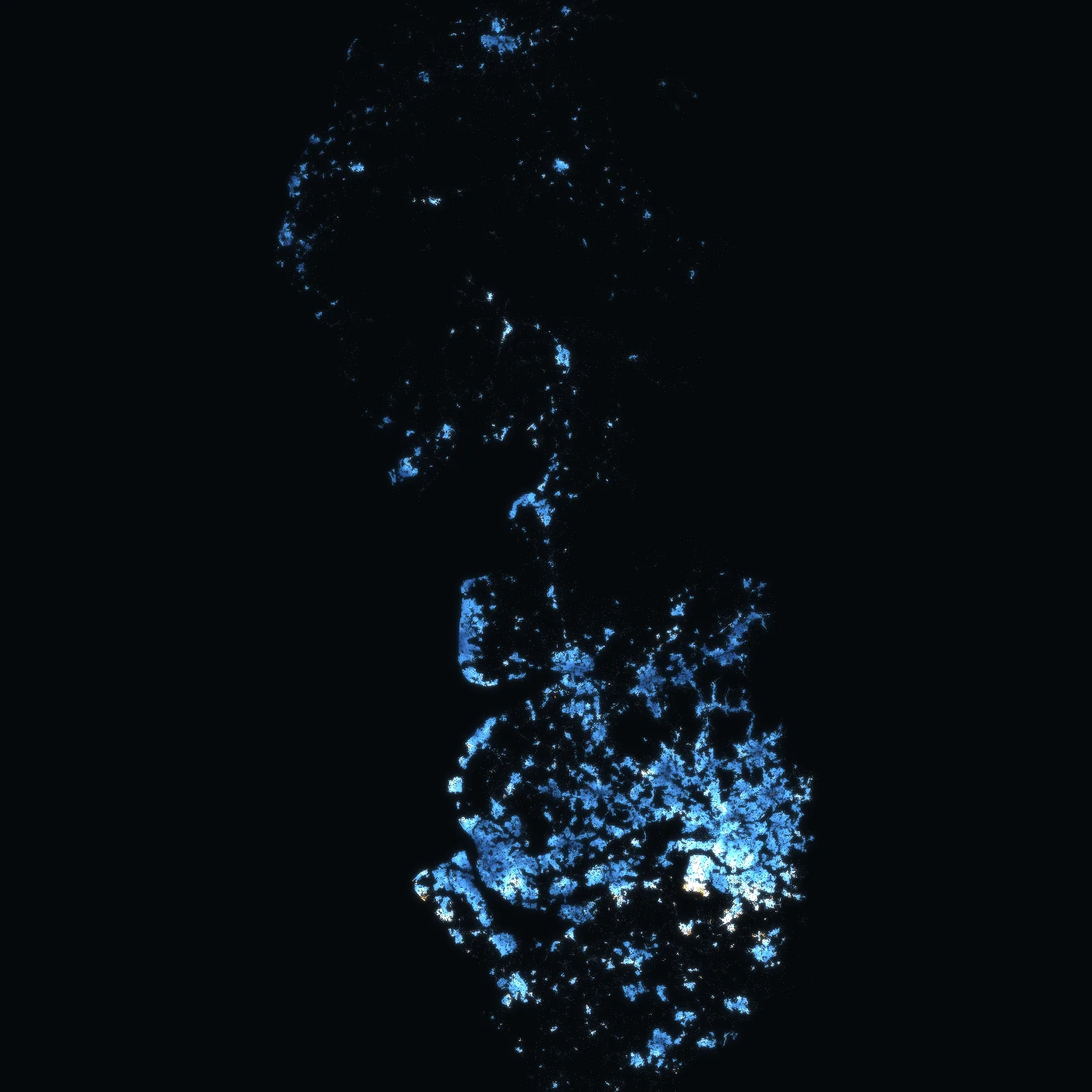 The North West at night: every address with a sale since 1995 a point of light, coloured by the median price of the homes sold around it