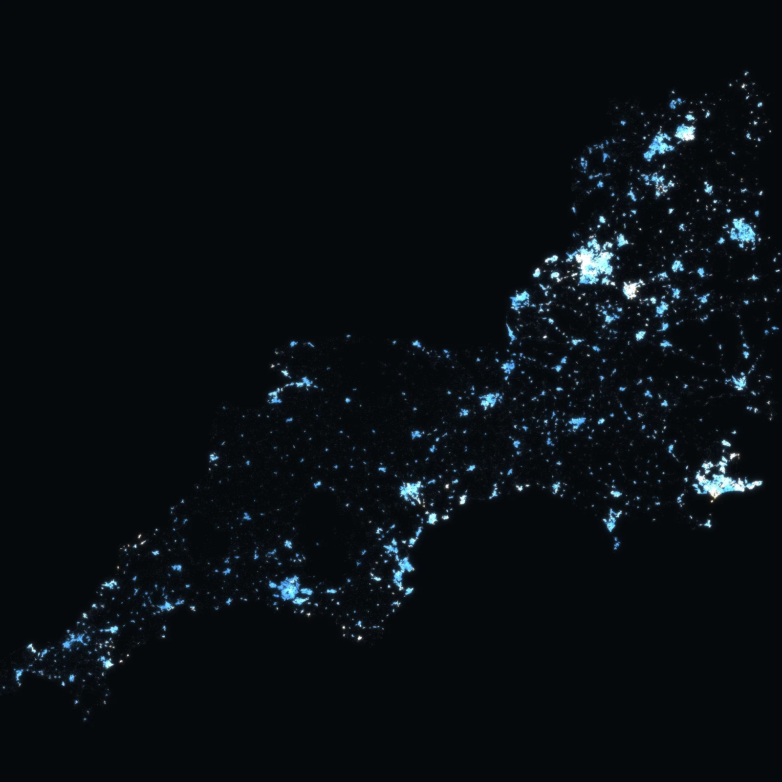 The South West at night: every address with a sale since 1995 a point of light, coloured by the median price of the homes sold around it
